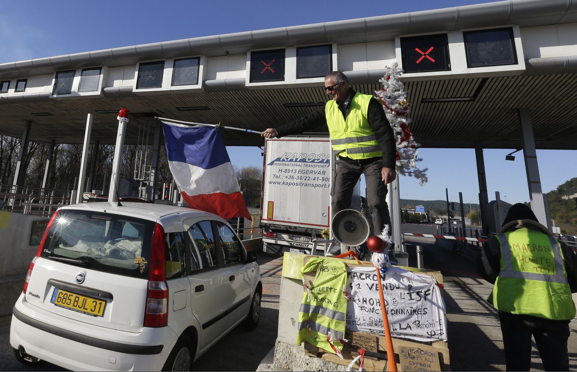 France Suspends Fuel Tax Hike, Protesters Vow To Fight On | Driving