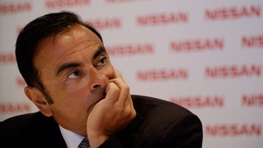 In this file photo, Nissan CEO Carlos Ghosn gestures during a 2015 press conference in Brazil.