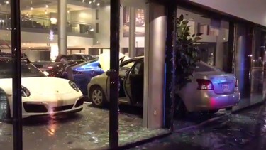 angry boyfriend smashes into a porsche dealership after bad breakup