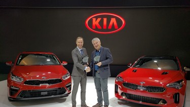 Mark Richardson, President of AJAC, presents the awards for Best Small Car in Canada for 2019, awarded for the Kia Forte; and Best Large Car in Canada for 2019, awarded for the Kia Stinger, to Michael Kopke, Director of Marketing for Kia Canada.