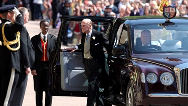 Queen Elizabeth II and Prince Philip, Duke of Edinburgh, arrive for the wedding ceremony of Britain's Prince Harry and US actress Meghan Markle at St George's Chapel, Windsor Castle on May 19, 2018 in Windsor, England.