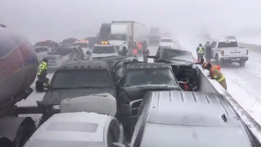 Vehicles are piled up after a crash on Highway 400 south of Barrie, Ont. on Monday, Feb. 25, 2019 in a photo from the Twitter user @OPP_HSD.