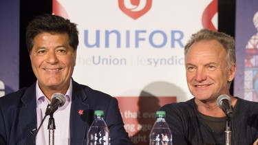 Sting, right, sits alongside Unifor National President Jerry Dias as they speak to the media after Sting and the cast of his musical "The Last Ship" performed in support of General Motors workers in Oshawa, on Thursday, Feb. 14, 2019.