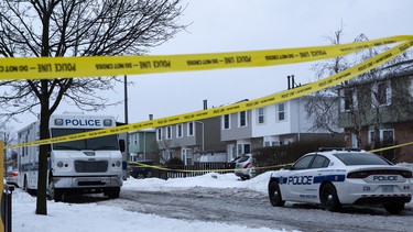 Police tape is seen outside of a house where a young girl was found dead in Brampton, Ont. on Friday, February 15, 2019.
