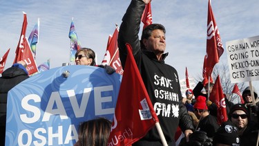 Jerry Dias, the national president for Unifor, the national union representing auto workers, addresses a rally within view of General Motors headquarters, Friday, Jan. 11, 2019, in Windsor, Ont.