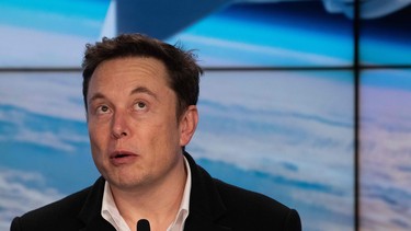 Tesla CEO Elon Musk speaks during a press conference after the launch of his SpaceX company's Crew Dragon Demo mission at the Kennedy Space Center in Florida on March 2, 2019.
