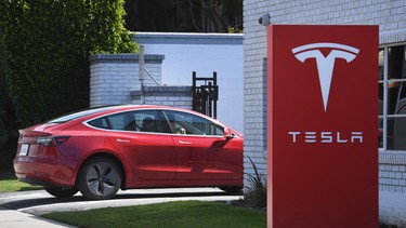 A Tesla car arrives at a service center in Los Angeles, California on March 4, 2019.