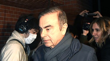 In this April 3, 2019, photo, former Nissan Chairman Carlos Ghosn returns to his residence in Tokyo.