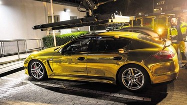 A gold foil-wrapped Porsche Panamera stopped in Germany for being too shiny