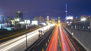 Traffic is blurred in a timed exposure on the Gardiner Expressway during the evening rush hour in Toronto, Ont. on Wednesday April 30, 2014.