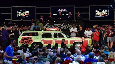 A replica of the Wagon Queen Family Truckster crossing the block at Barrett-Jackson's Palm Beach event in April 2019.