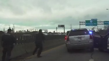 Woman nearly runs over police in chase, says she was late for work