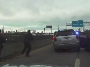 Woman nearly runs over police in chase, says she was late for work