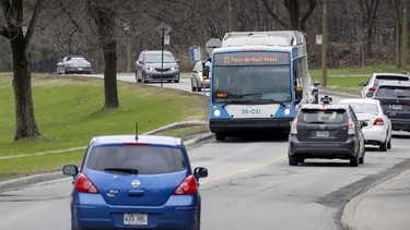 Cars cross Mount Royal in Montreal Thursday May 2, 2019.  The city's consultation bureau recommended Remembrance Road-Chemin Camillien-Houde retaining car access to the mountain following the controversial pilot project in summer 2018 that saw through-traffic cut off.