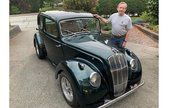 Ken Green with his 1946 Morris 8 mini street rod that was found abandoned in a field outside Calgary.