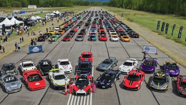 Take our word for it: there are indeed 294 luxury and supercars assembled on the Pemberton Airport runway to set a new Guinness record.