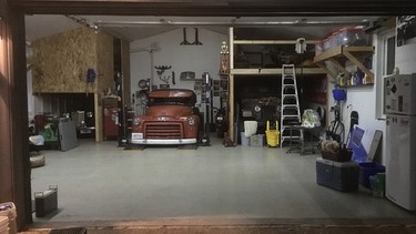 Lurking in Bob Ward’s shop is his late dad’s MG TD on the left, his custom built 1952 GMC 3-ton truck and a project Jeep CJ-6.