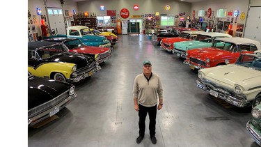Doug Taylor with his 14 collector vehicles that are reminders of seven generations of the Taylor family who have lived on Taylor Road in Mount Lehman.