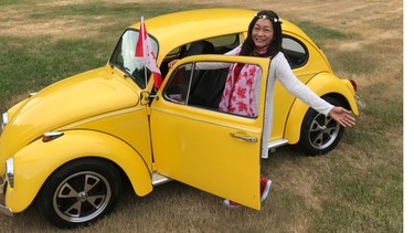 Ailaj Fulton gets into the Canada Day spirit with her 'Magic Car' birthday gift from her husband Lewis Thaw.