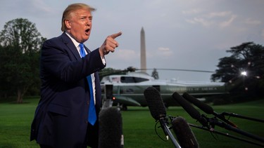 US President Donald Trump speaks with reporters as he departs the White House, in Washington, DC, on June 2, 2019. (