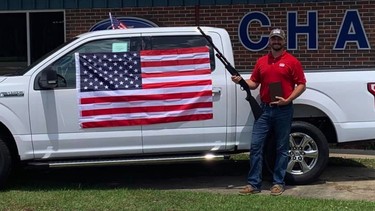 Ford shuts down Alabama dealership’s idiotic “shotgun, bible and flag” sales incentive