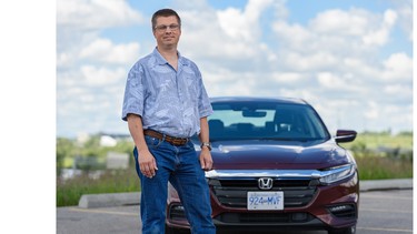 Rod Johnson with the 2019 Honda Insight at Max Bell Arena parking lot in Calgary.