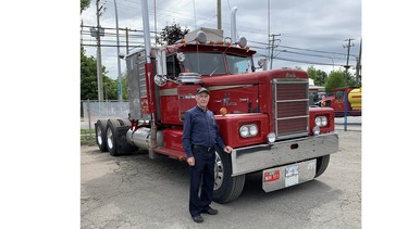 Arnie De Jong with the Hayes Clipper highway truck he has been driving since 1966.