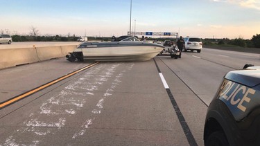 Boat blocks Toronto highway on Canada Day, sparks national caption contest