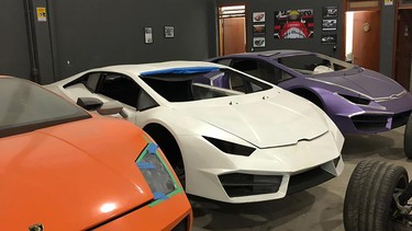 This handout picture released by Santa Catarina's Civil Police shows replicas of luxury  cars seized at a clandestine workshop in Itajai, Santa Catarina state, Brazil, on July 15, 2019.