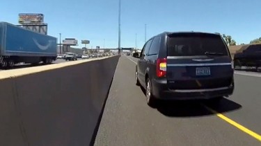A funeral home's Dodge Grand Caravan pulled over on a highway in Nevada