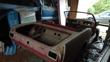 The rusty and battered hulk of Lisa LaMothe’s 1966 Mustang convertible before restoration.