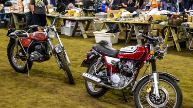 Motorcycles and parts at the Millarville Vintage Motorcycle Swap Meet in the old riding arena. This building collapsed early in 2018, and a new arena has been built in its place. In 2019, the event takes place on Sunday, Sept. 8.