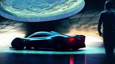 An Aston Martin mid-engined supercar prototype in an underground "lair"