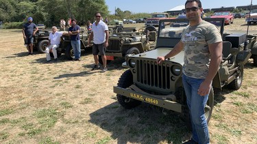 Kam Mann with fellow members of the Indo-Canadian Jeep Club and their restored World War Two military vehicles.