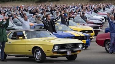 A gathering of more than 1,300 Ford Mustangs in Belgium, there to set a parade record