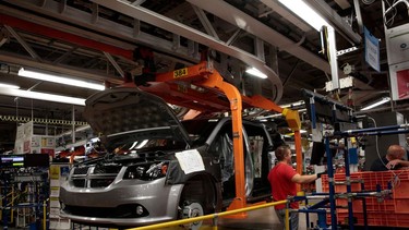 Workers are seen at the FCA Windsor Assembly Plant on Oct. 5, 2018 in Windsor.