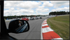 A procession of Micras follow the Nismo RC car during a procession lap of Mosport.