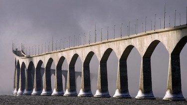 The Confederation Bridge - seen from Borden, P.E.I. - is envelopped by mist rising from the Northumberland Strait on Sunday, Dec. 21, 2008.
