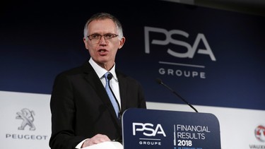 PSA Peugeot Citroen Chief Executive Carlos Tavares delivers a speech during the presentation of the company's 2018 full year results, in Rueil Malmaison, west of Paris, Tuesday, February 26, 2019.