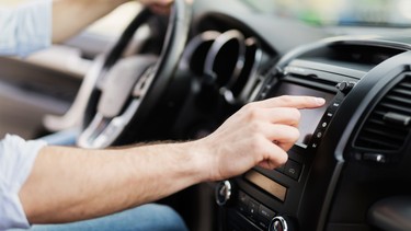 Man Using Gps Navigation System In Car