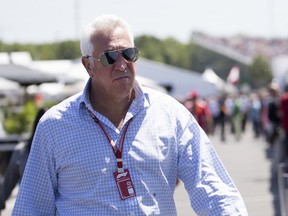 Lawrence Stroll enters the pit area where his son, Williams driver Lance Stroll of Canada, is practicing rounds at the Formula 1 in Montreal on Friday June 8, 2018.