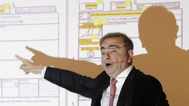 Former Renault-Nissan boss Carlos Ghosn gestures as he addresses a large crowd of journalists on his reasons for dodging trial in Japan, where he is accused of financial misconduct, at the Lebanese Press Syndicate in Beirut on January 8, 2020.