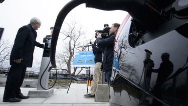 Marc Garneau, Minister of Transport, holds a photo opportunity at a new charge station for electric vehicles on Parliament Hill in Ottawa on Wednesday, May 1, 2019, to mark the coming into effect of the Incentive for Zero-Emission Vehicles Program.