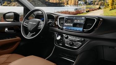 The interior of the 2021 Chrysler Pacifica Pinnacle model includes a new integrated Ultra console, the all-new Uconnect 5 system with a 10.1-inch touchscreen that delivers the largest standard touchscreen in its class and new accent points, including Caramel Nappa leather seats and a Mid-century Timber Hydro bezel.