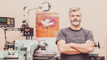 Dale Marchand with his Feeler Precision EM 618 Model tool room lathe in his shop just outside of Edmonton.