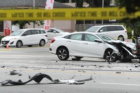 Police on scene at two-car crash on Oak St at 49th Ave in Vancouver, B.C., May 29, 2019