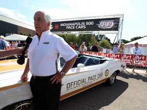 Roger Penske is interviewed before a dream cruise event by Penske drivers in 16 pace cars, which represented the 16 Indianapolis 500 victories for Penske drivers on Woodward Avenue in Royal Oak on Thursday, August 13, 2015.