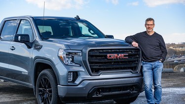 Barry Lister with the  2020 GMC Sierra he recently drove around Calgary for a week.