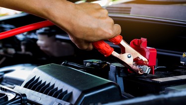 Jump-starting a car with booster cables