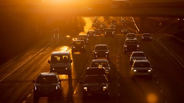 Vehicles travel along highway 401 in Toronto, April 6, 2020.